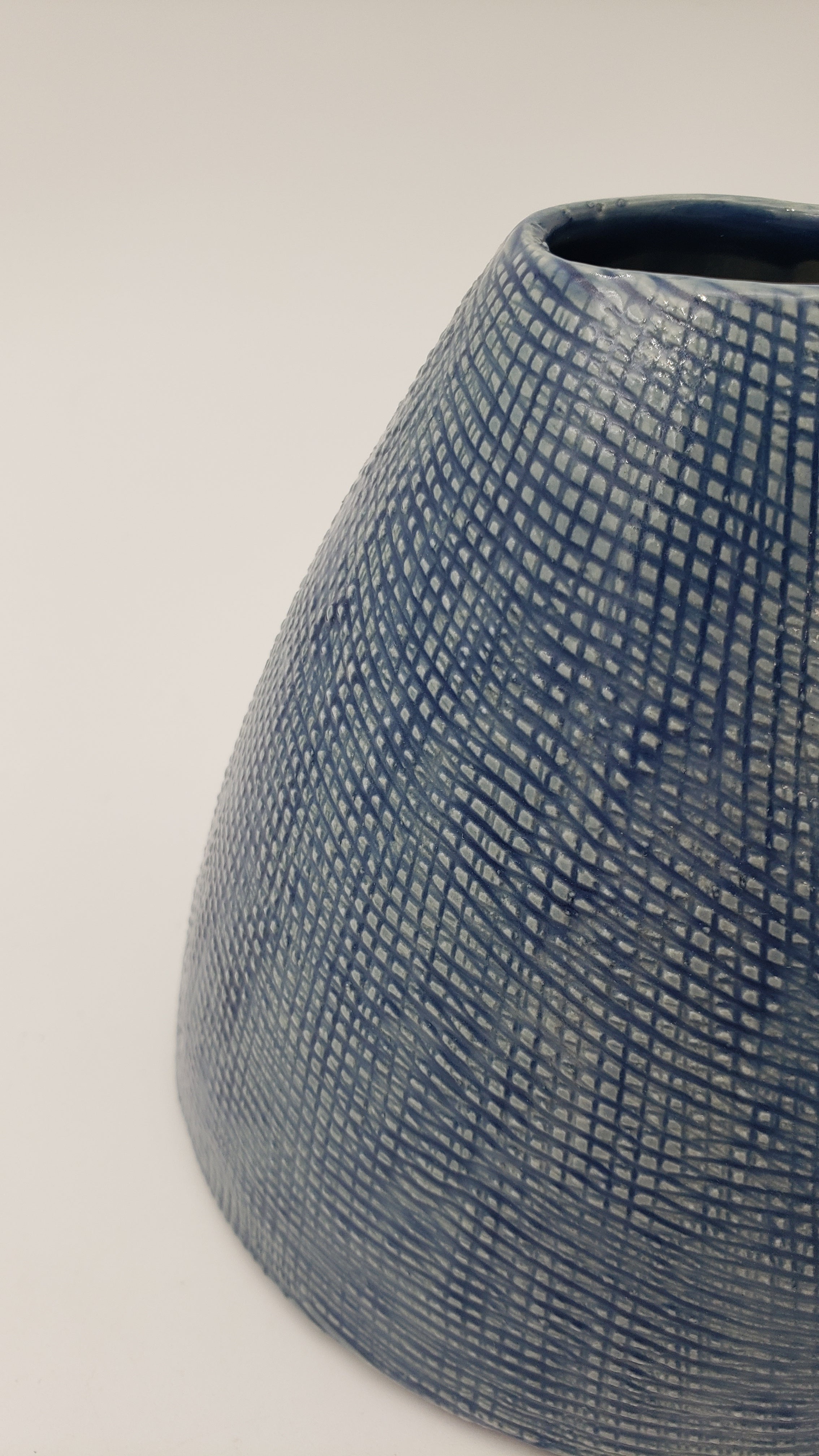Textured glossy blue vase