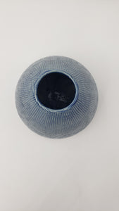 Textured glossy blue vase