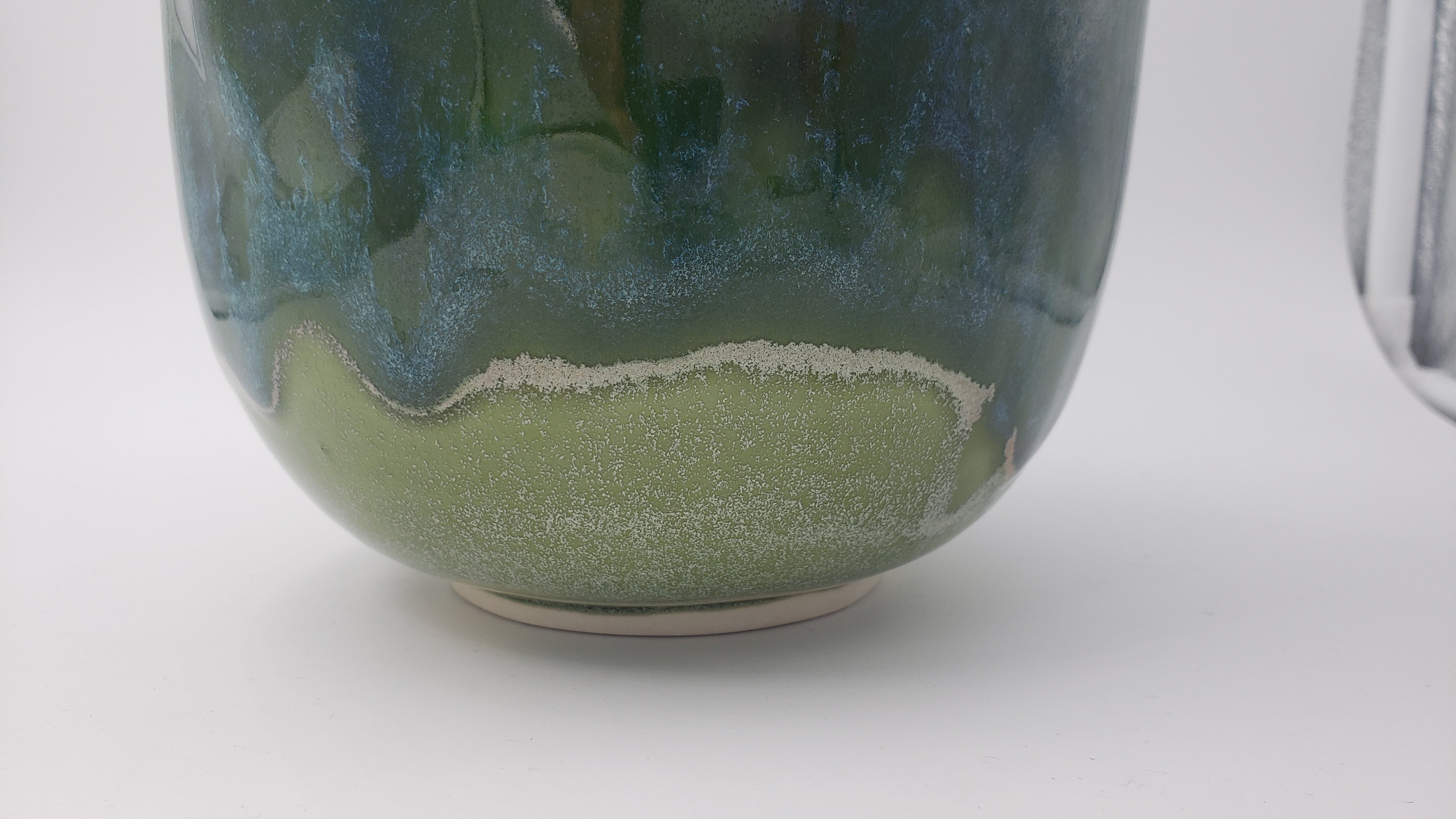 Large round vase in deep grass green