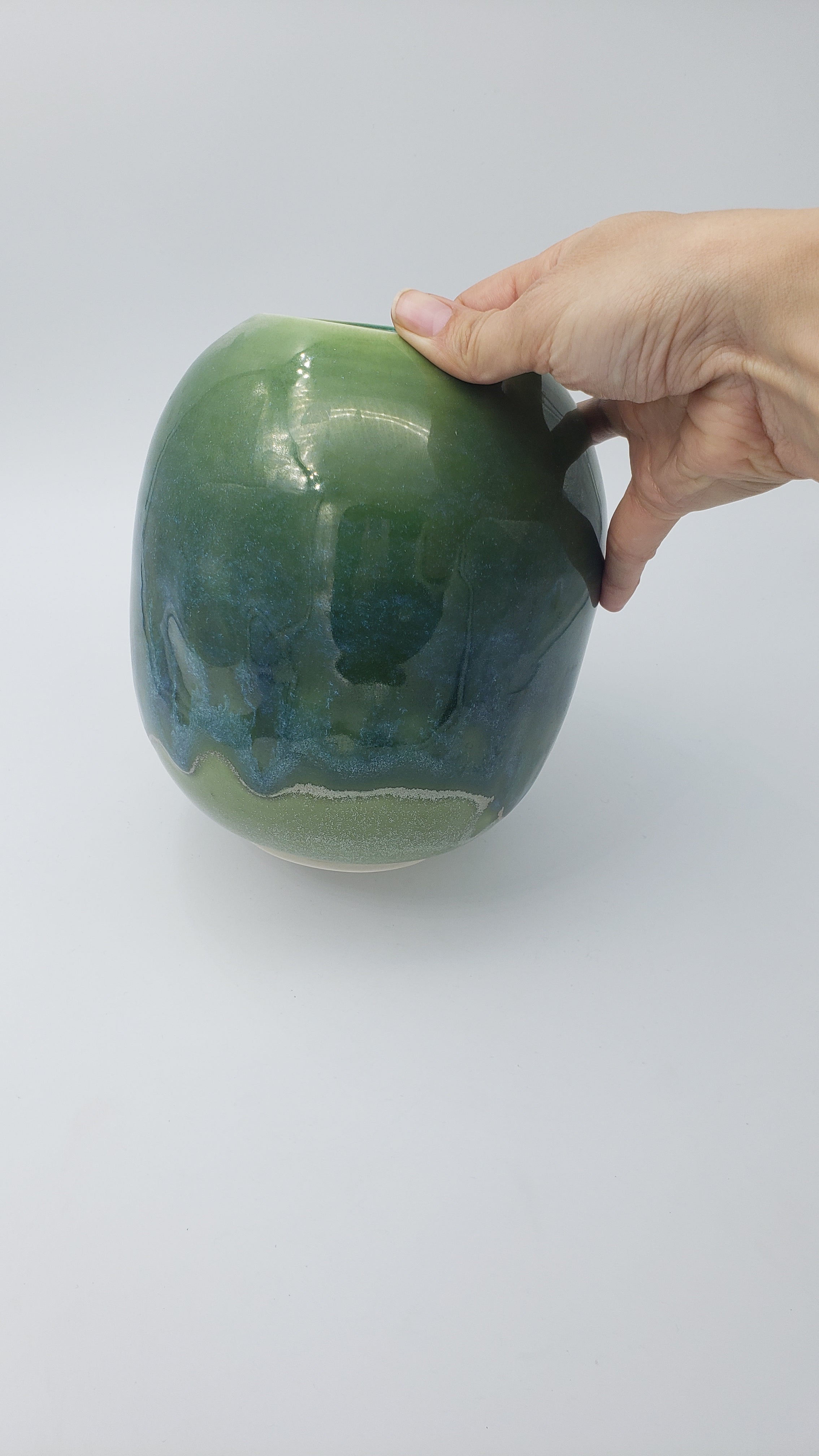 Large round vase in deep grass green