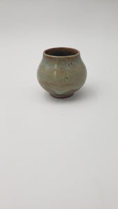 Small round planter in blue green