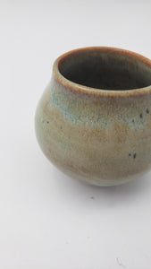 Small round planter in blue green